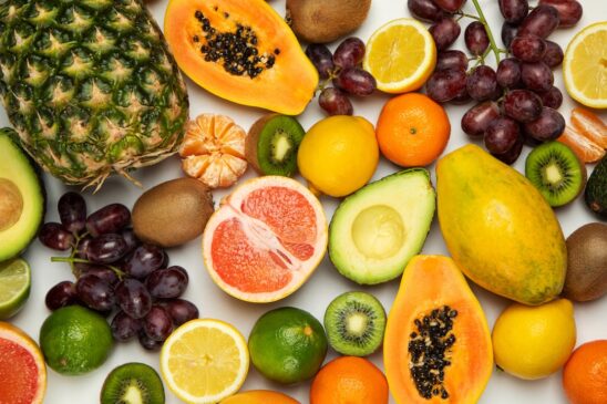 FITPULSE | Healthy Skin Diet: Nourish Your Skin from Within sliced orange fruit and green round fruits