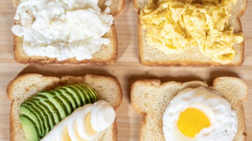 Four slices of bread with different types of food on them